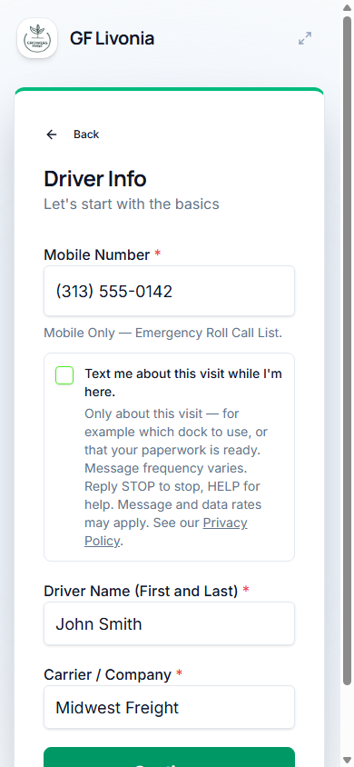 The driver check-in screen: a mobile number field, and below it an unticked box reading 'Text me about this visit while I'm here.'